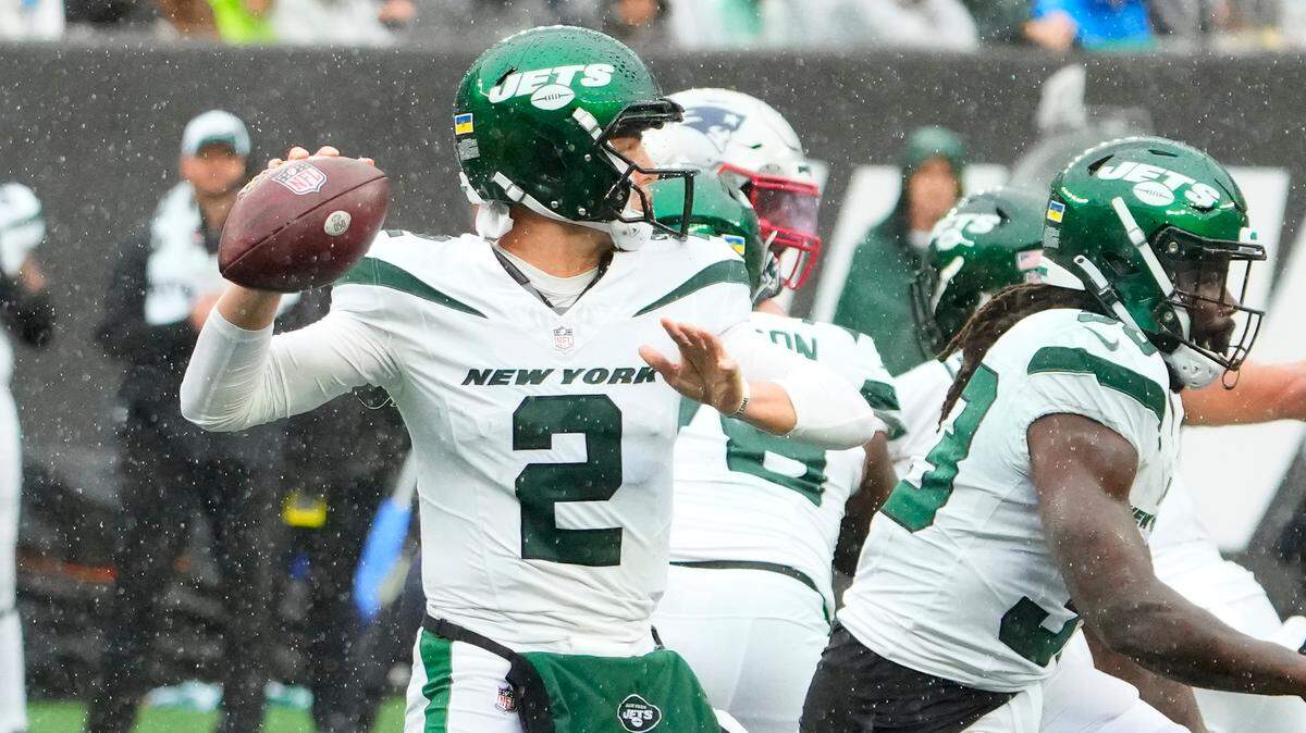 Sep 24, 2023; East Rutherford, New Jersey, USA; New York Jets quarterback Zach Wilson (2) throws against the Patriots in the second half at MetLife Stadium. Mandatory Credit: Robert Deutsch-USA TODAY Sports