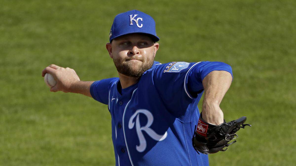 Kansas City Royals pitcher Jesse Hahn throws during the fifth inning of a spring training baseball game against the Cleveland Indians Sunday, Feb. 23, 2020, in Surprise, Ariz. (AP Photo/Charlie Riedel)