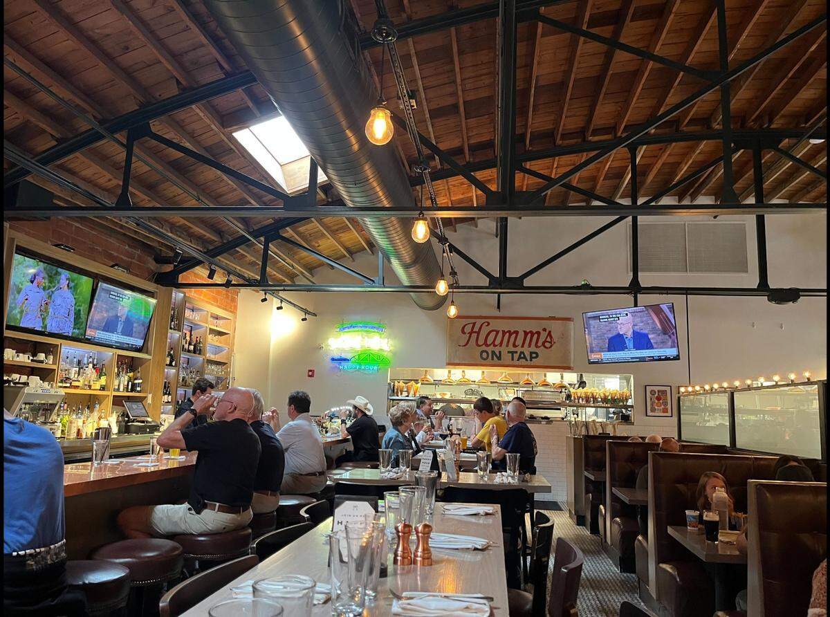 Customers enjoy the bar and lounge Third Street Social’s Lee’s Summit location, 123 S.E. Third St. The restaurant offers a $5 cheeseburger and fries deal on Mondays from 3 p.m. until it closes.