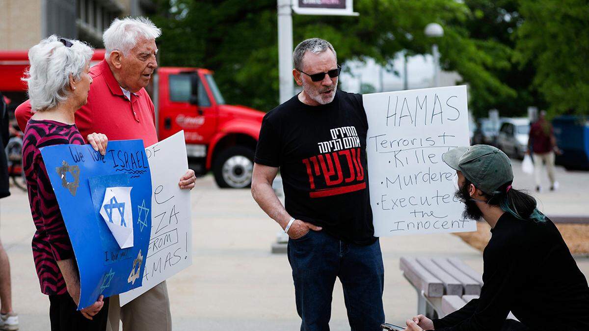 A pro-Palestine protester (right) engaged with pro-Israel counter-protesters at Missouri State University last year.