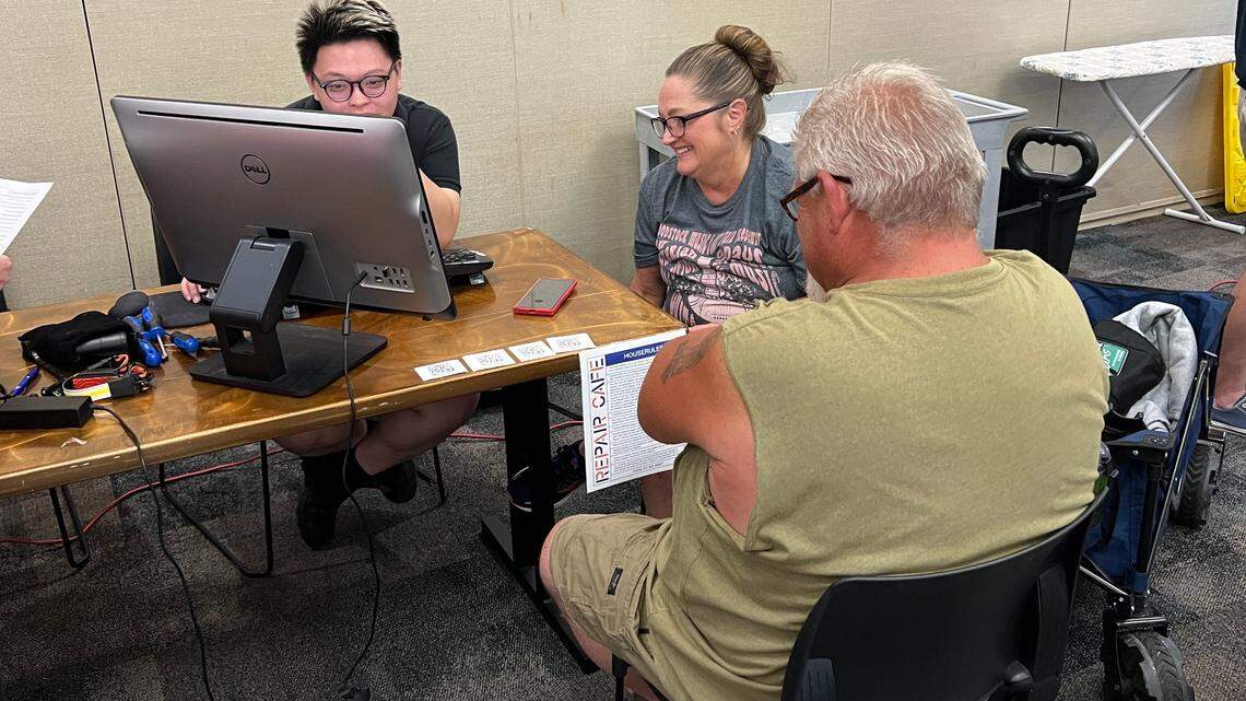 Volunteers gather at a Repair Cafe held last year.