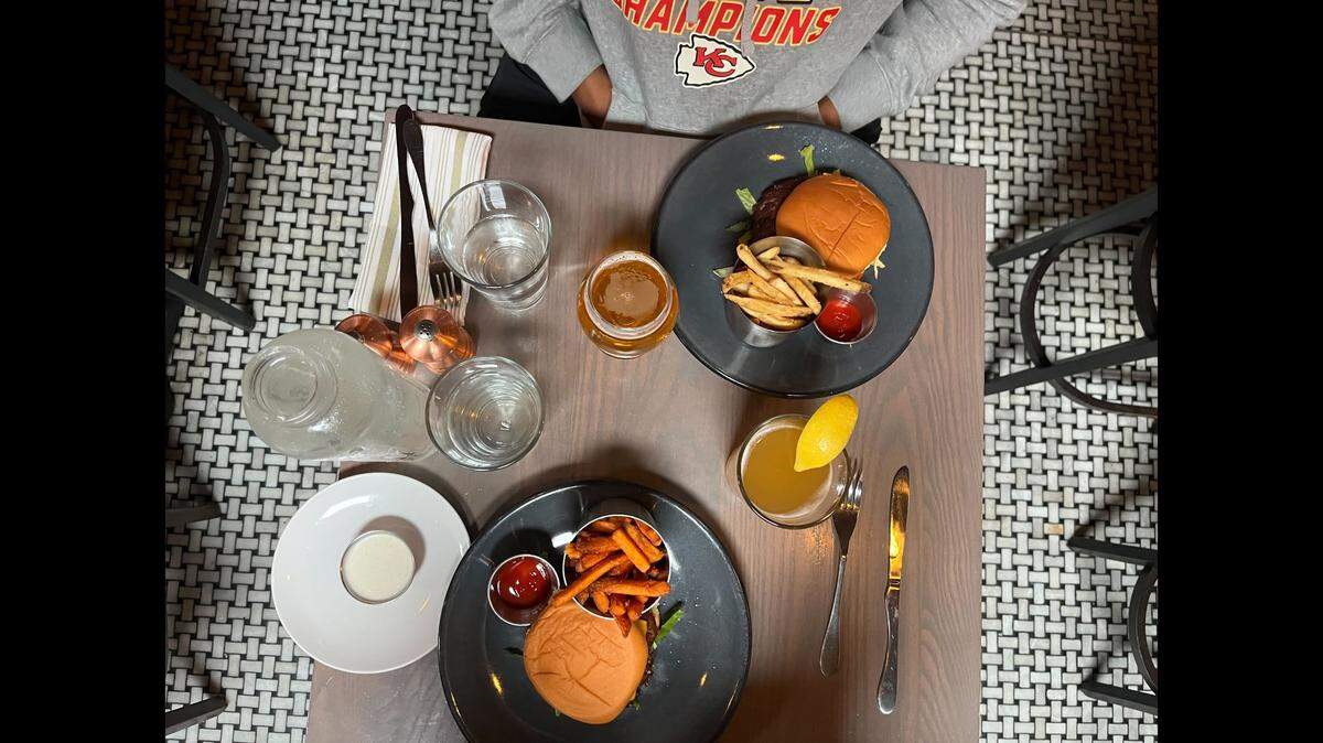 Two Social Cheeseburgers and two happy hour-priced alcoholic beverages cost a total of $21.88 at Third Street Social. The cheeseburger special is only available on Mondays in the bar and lounge area, and it’s available from 3 p.m. until the restaurant closes.