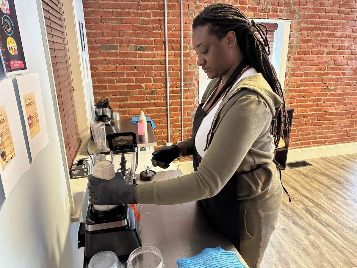 Owner Tatiana Johnson whips up a Strawberry Shortcake shake.