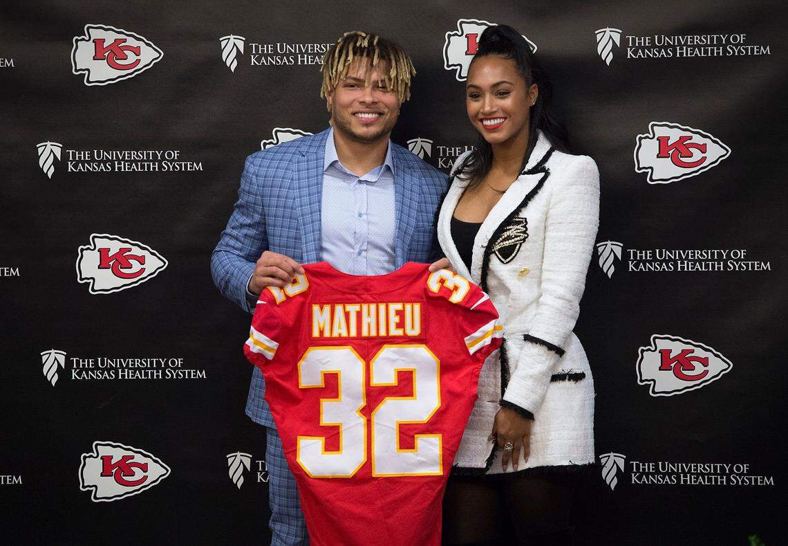 When Tyrann Mathieu was introduced in 2019 as the Chiefs’ new safety, he posed with his longtime girlfriend, Sydni Paige Russell, at a news conference in Kansas City.