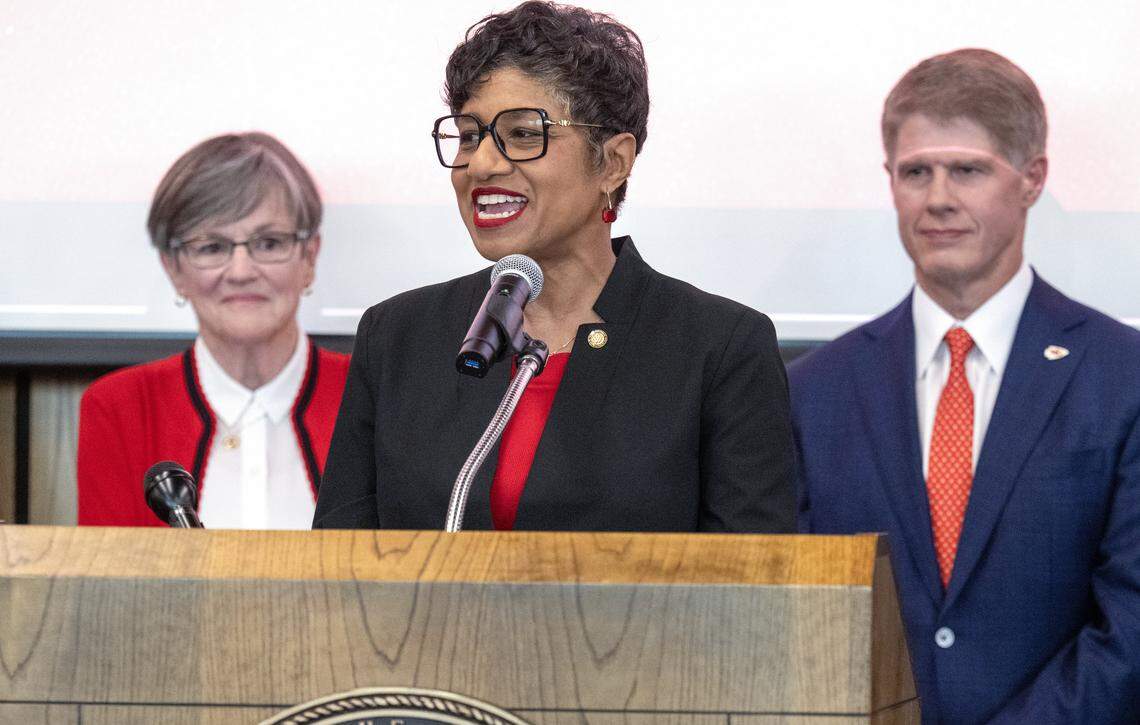 Christal Watson, Mayor of Kansas City, Kansas, addresses the crowd after Governor Laura Kelly's announcement on Monday, Dec. 22, 2025, that the Kansas City Chiefs will build their new stadium in Kansas City, Kansas. Chiefs owner Clark Hunt looks on.