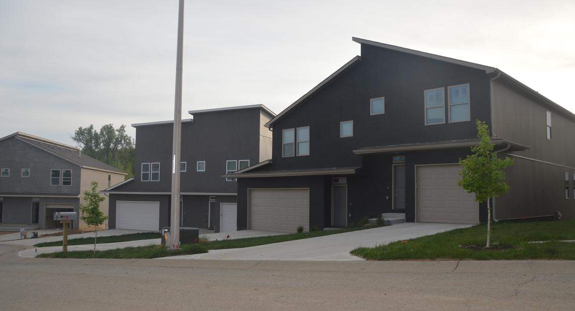 A family has left their new home in a Kansas City neighborhood after returning home one evening to find racial and religious slurs spray-painted inside and their staircase burned.