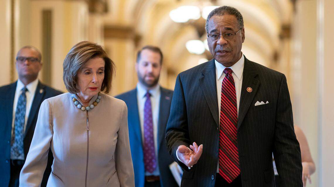 In this file photo from 2020, Speaker of the House Nancy Pelosi, left, walks with Rep. Emanuel Cleaver at the Capitol in Washington, D.C. Cleaver is in a position to influence housing policy under President Joe Biden, but the clock is ticking for the Missouri Democrat.