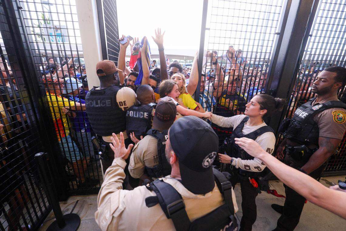 Fans rush the gates before the Copa America Final match between Argentina and Colombia at Hard Rock Stadium on July 14, 2024.