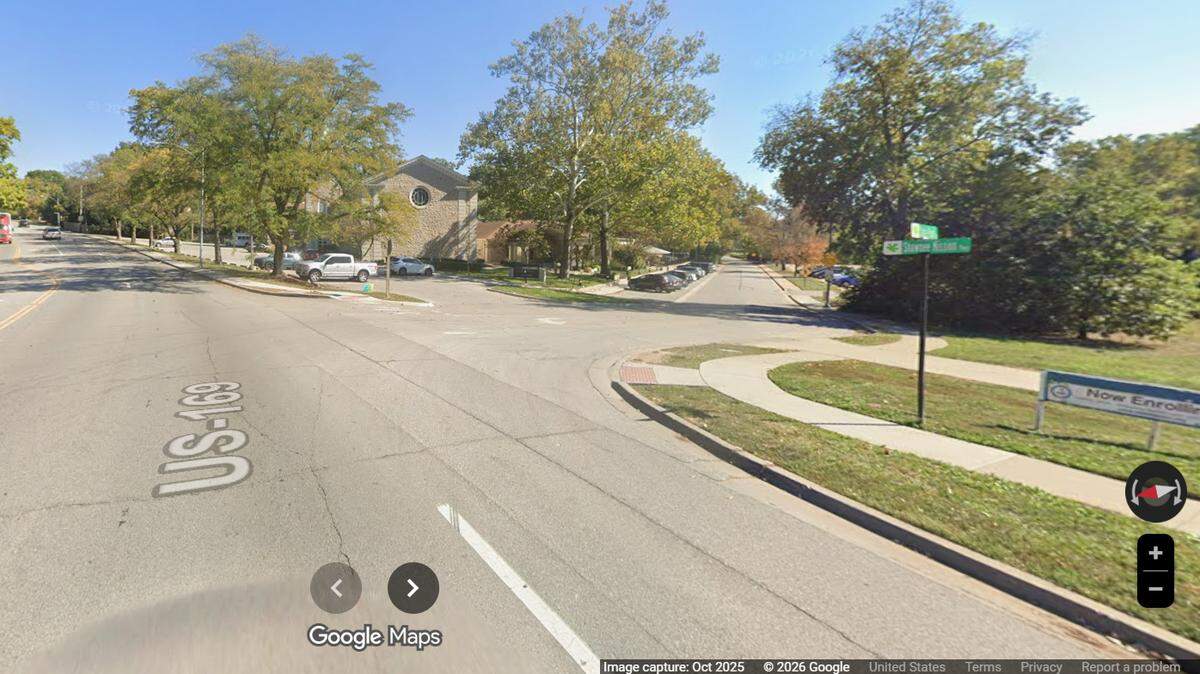 A vehicle ran off the road at Shawnee Mission Parkway and State Park Road in Fairway, Kansas, as seen in this Google Maps street view image. The vehicle collided with a man on a riding lawn mower, hospitalizing him, police said.