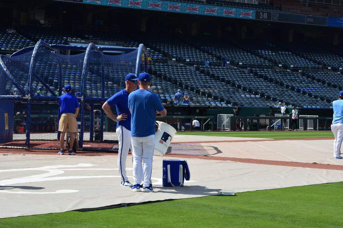 Royals manager Matt Quatraro (left) and Bill Duplissea (right) chat pregame ahead of the club’s game on May 9, 2026 against the Detroit Tigers.
