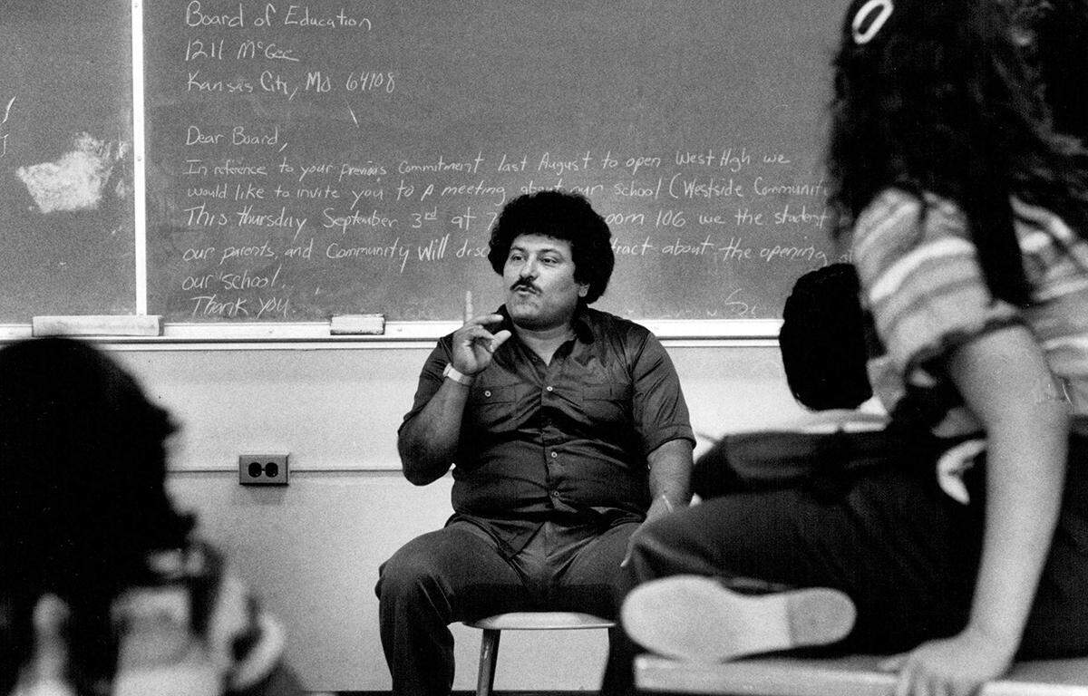 Don Pecina talks to one of two classes being held Monday at the old West High School. One assisgnment in the English class was to write a letter to the Board of Education. Thirty-five students showed up for class despite warnings that they would not received academic credit.