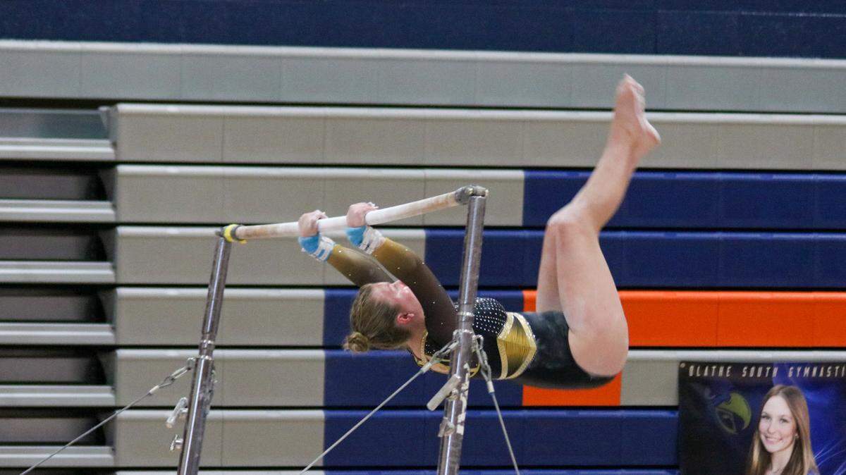 Allison Boese, 17, a senior at Newton High School, competes in the KSHSAA Girls Gymnastics State Championships on Oct. 25, 2025.