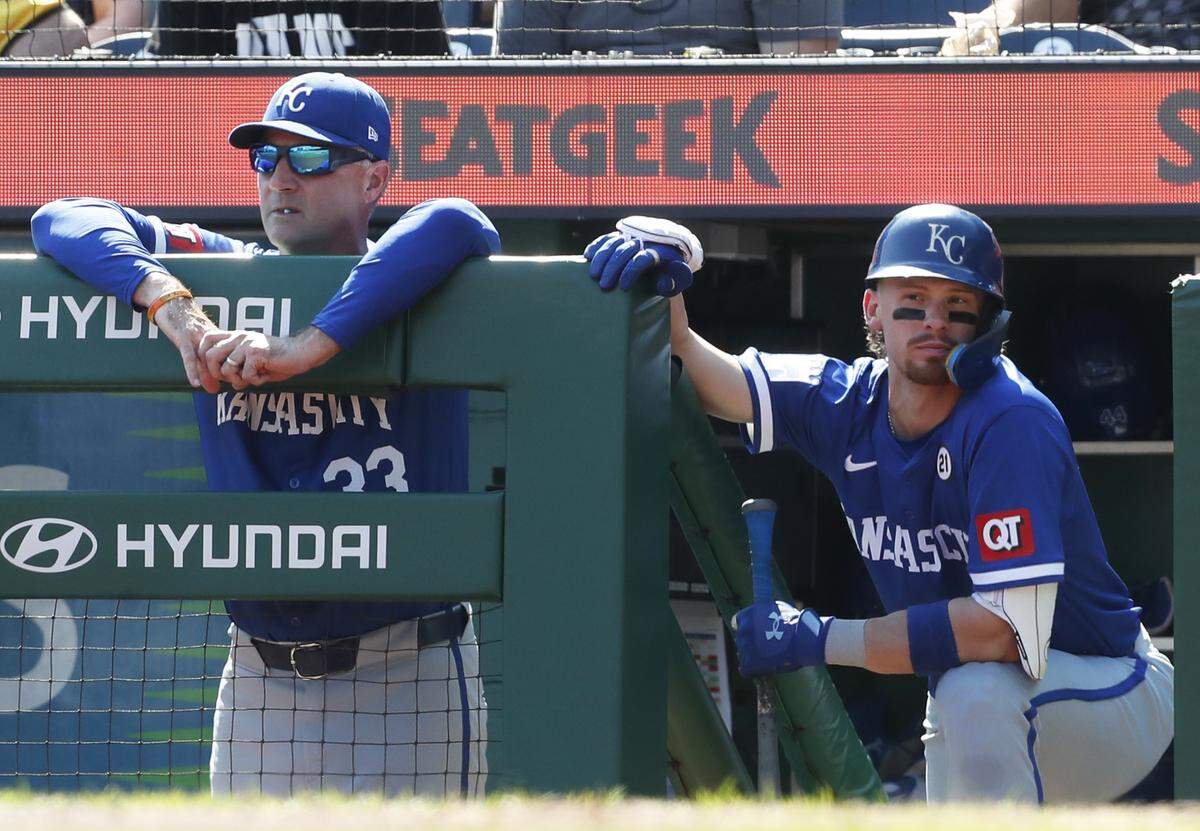 Kansas City Royals manager Matt Quatraro (left) and shortstop Bobby Witt Jr. look on from the dugout during Sunday’s game against the Pittsburgh Pirates at PNC Park.