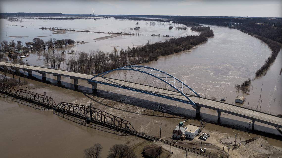 This aerial view shows the swollen Missouri River well out of its banks Friday afternoon in Atchison, Kan.