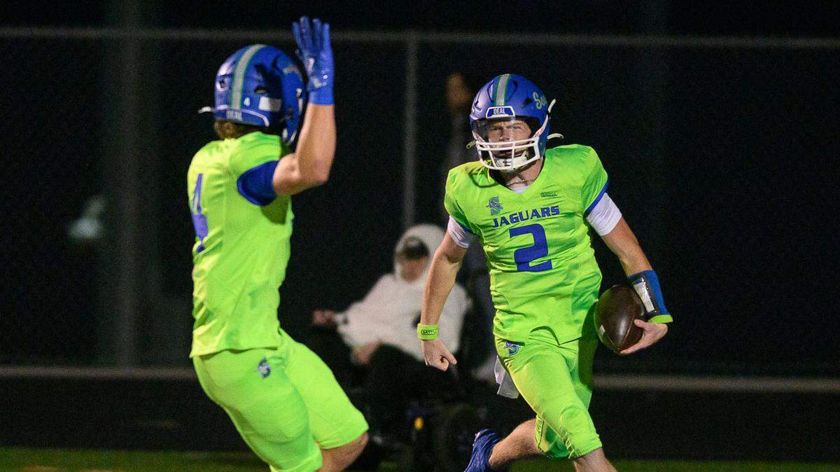 Blue Springs South’s Ayden Wilhelm, right, celebrates a touchdown with teammate Wyatt Denney during a 19-12 high school football playoff victory over Blue Springs on Friday, Nov. 8, 2024.