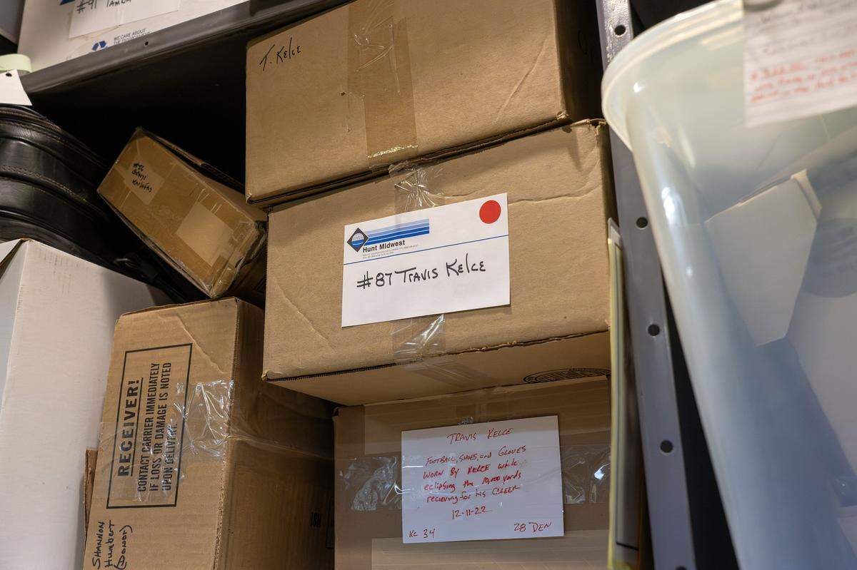Boxes holding Kansas City Chiefs tight end Travis Kelce’s player equipment are stored in the Artifact Room inside the team’s underground storage facility in Kansas City.