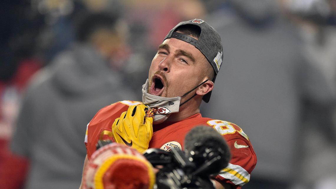 Kansas City Chiefs tight end Travis Kelce lowers his mask to shout in celebration after the Kansas City Chiefs defeated the Bills 38-24 to win AFC Championship Game at Arrowhead Stadium Sunday Jan. 24, 2021. The Chiefs will return to the Super Bowl.