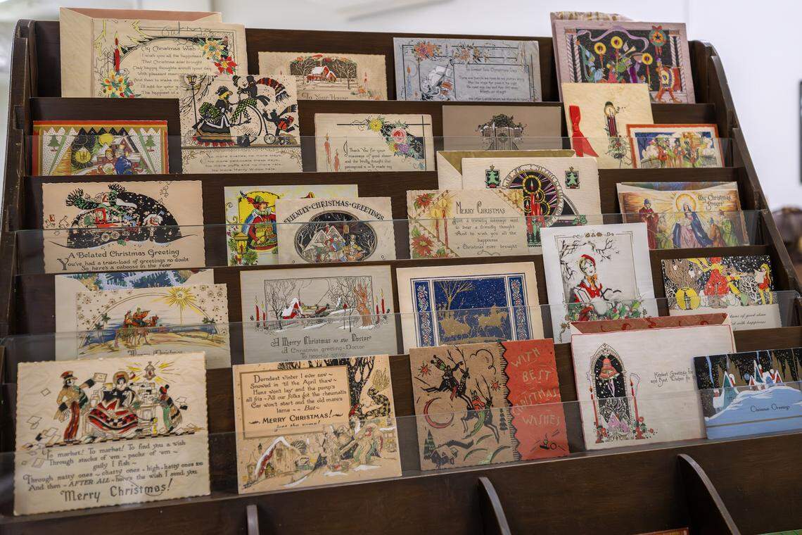 Original Hallmark cards are displayed in a wooden display case in the Hallmark archives at the Hallmark headquarters on Aug. 5 in Kansas City.