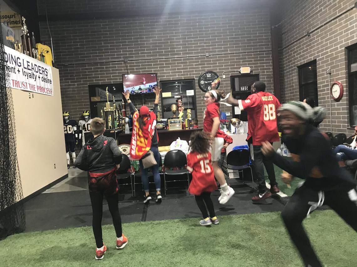 As the final seconds ticked off the clock, members of the Missouri Wolverines jumped in jubilation at their watch party in Kansas City’s East Bottoms.