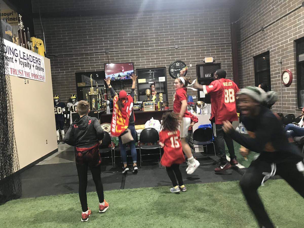 As the final seconds ticked off the clock, members of the Missouri Wolverines jumped in jubilation at their watch party in Kansas City’s East Bottoms.