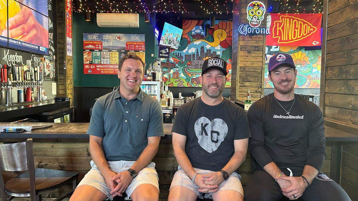 From left, Tyler Humar, Shawn Larson and Danney Elmore inside Humar and Larson’s Social. The three are preparing to open Revel Sports Tavern in Johnson County.