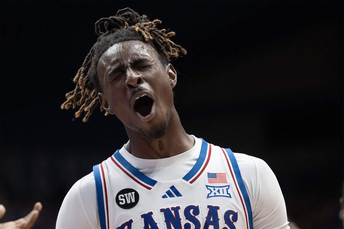 Kansas Jayhawks guard Jamari McDowell (11) was pumped up as the team came on strong in the second half against the Iowa State Cyclones on Tuesday, Jan. 13, 2026, at Allen Fieldhouse in Lawrence.