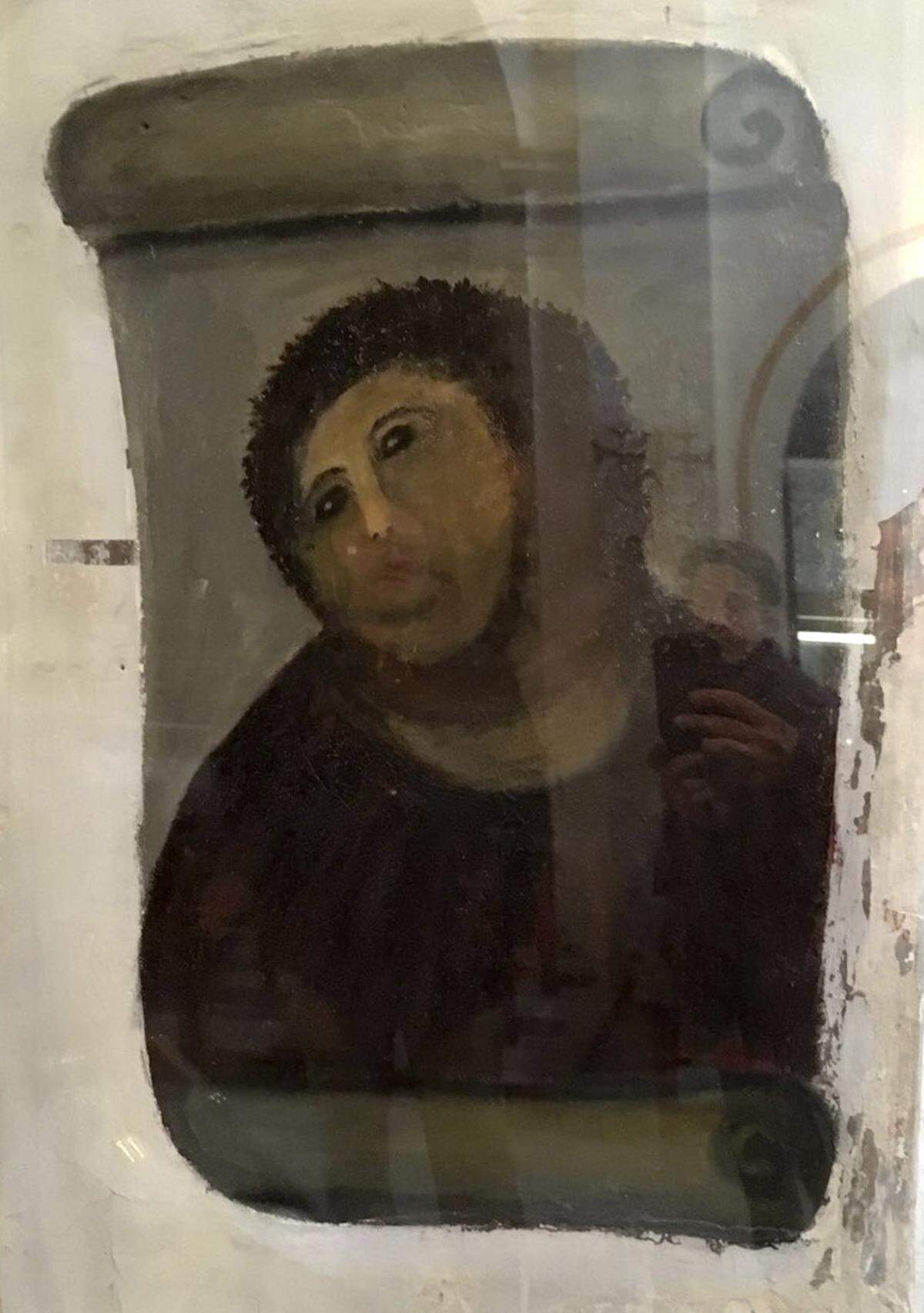 View of the deteriorated version of "Ecce Homo" mural by 19th century painter Elias Garcia Martinez, at the Borja Church in Zaragoza, Spain, Wednesday, March 16, 2016.
