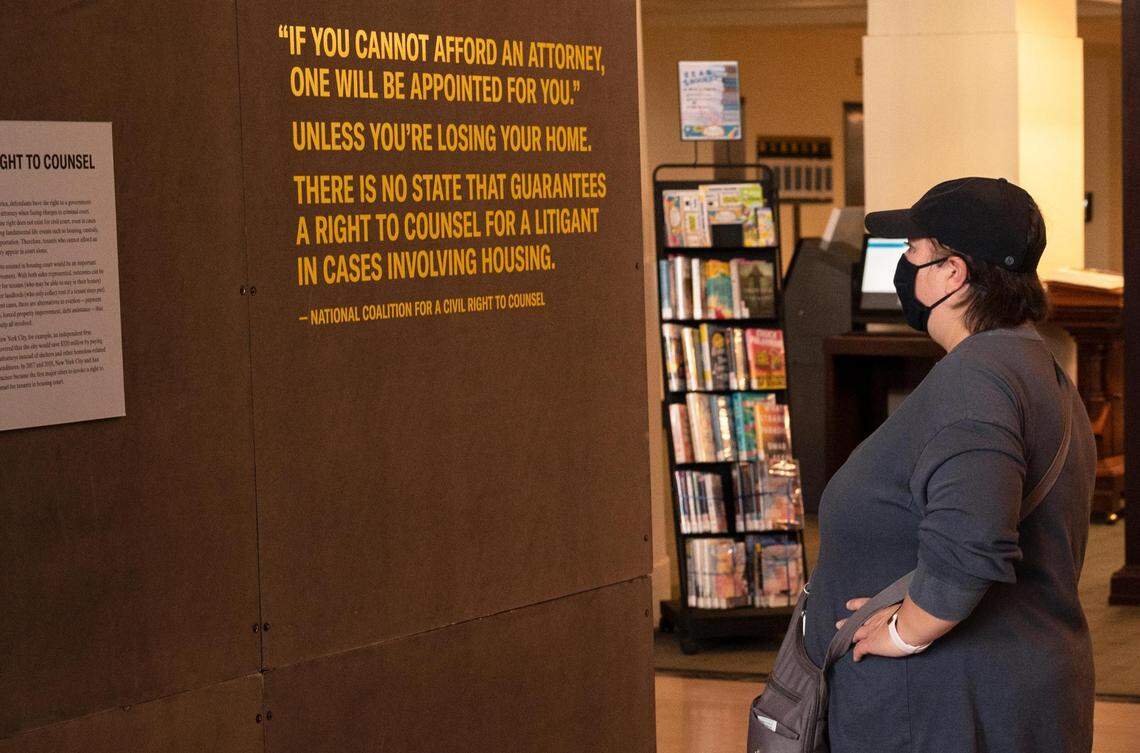 Bianca Barlaan explores the “Evicted” art exhibit at the Central Library downtown.