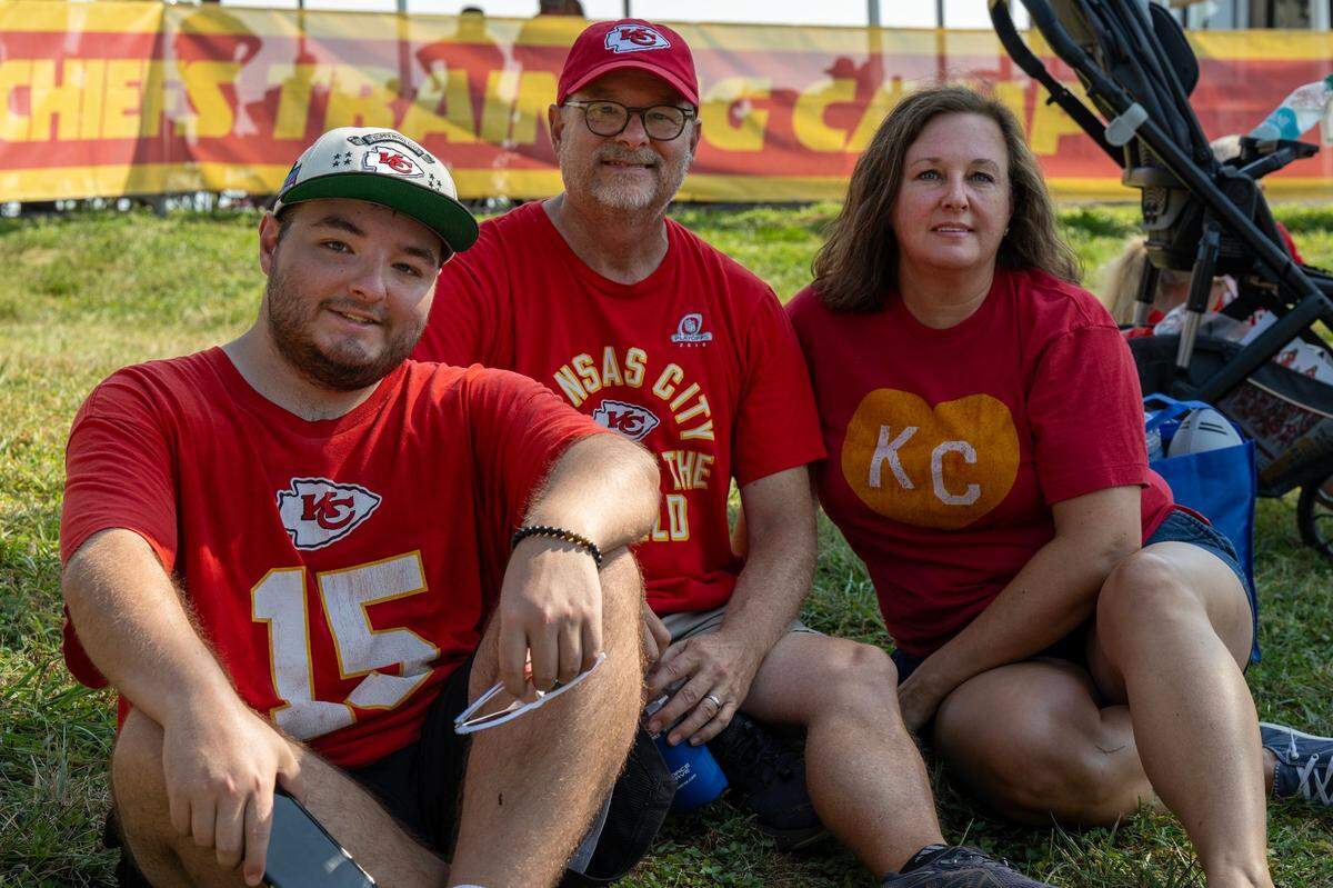 Thomas Rawson, left, Keith Rawson, and Molly Fisher attend training camp in St. Joseph.