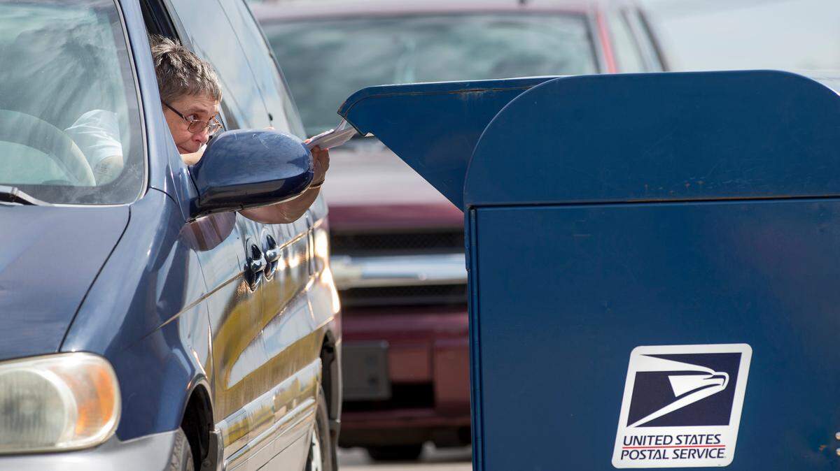 Postal customer Carol Dale at the Shawnee Mission Post Office. The Mission location is one of four Kansas City-area postal facilities being audited by the USPS.