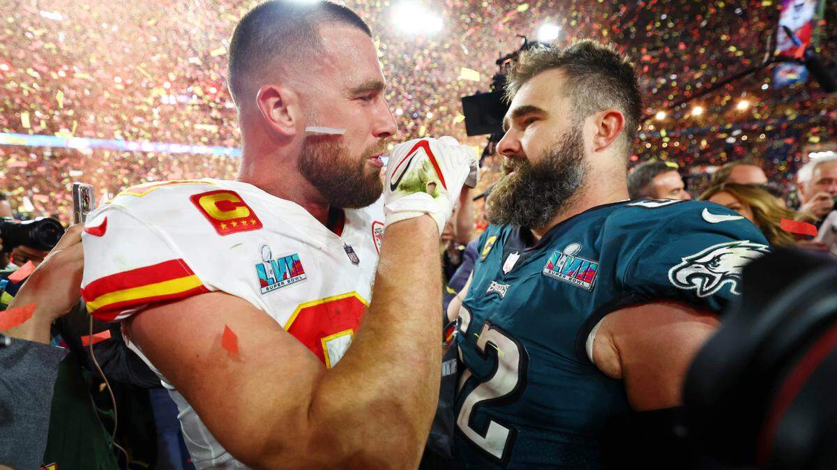 Feb 12, 2023; Glendale, Arizona, US; Kansas City Chiefs tight end Travis Kelce (87) talks with his brother Philadelphia Eagles center Jason Kelce (62) after he won Super Bowl LVII at State Farm Stadium. Mandatory Credit: Mark J. Rebilas-USA TODAY Sports