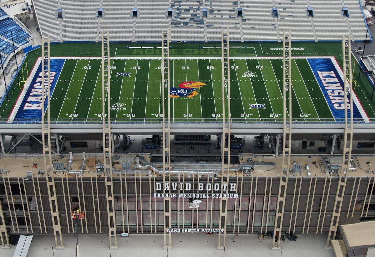 Renovations totaling about $450 million have remade the west and south side of David Booth Kansas Memorial Stadium, seen on Monday, Aug. 18, 2025, at the University of Kansas in Lawrence.  The Kansas Jayhawks will open the season as they host Fresno State on Saturday, August 23, 2025, at the stadium.  Renovations to the east side of the stadium will happen in the next phase. 