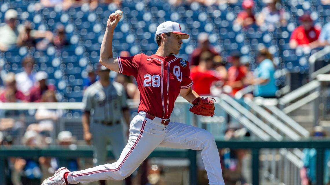 Oklahoma starting pitcher David Sandlin (28) throws a pitch against Texas A&M in the first inning during an NCAA College World Series baseball game Wednesday, June 22, 2022, in Omaha, Neb. (AP Photo/John Peterson)