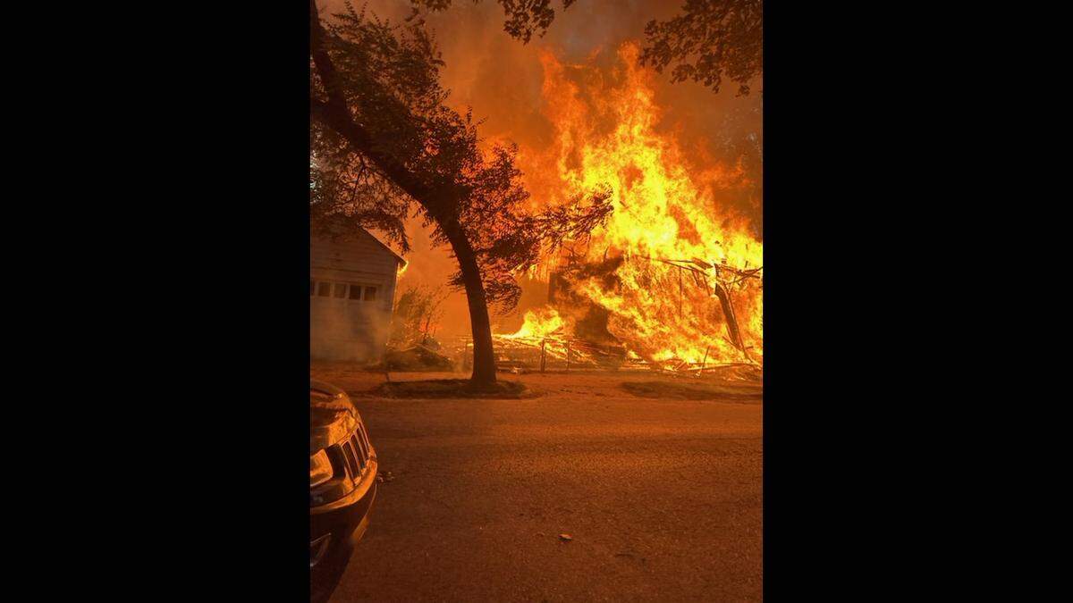 A two-alarm fire that destroyed two houses under construction in the Kansas City neighborhoods between Westport area and the Country Club Plaza is being called suspicious, a fire department spokesman said Tuesday.