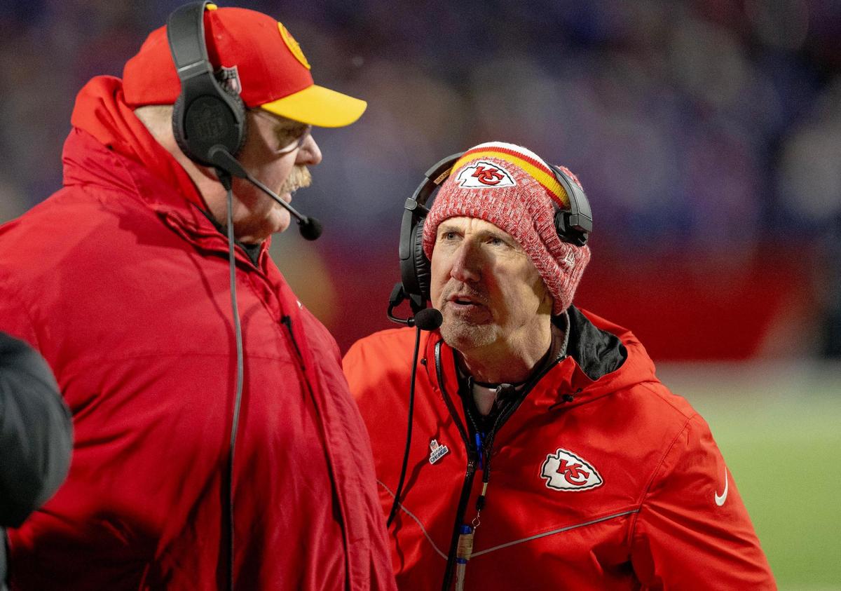 Chiefs defensive coordinator Steve Spagnuolo, right, talks strategy with head coach Andy Reid during Kansas City’s Jan. 21, 2024 AFC Divisional game against the Buffalo Bills at Highmark Stadium in Orchard Park, New York.