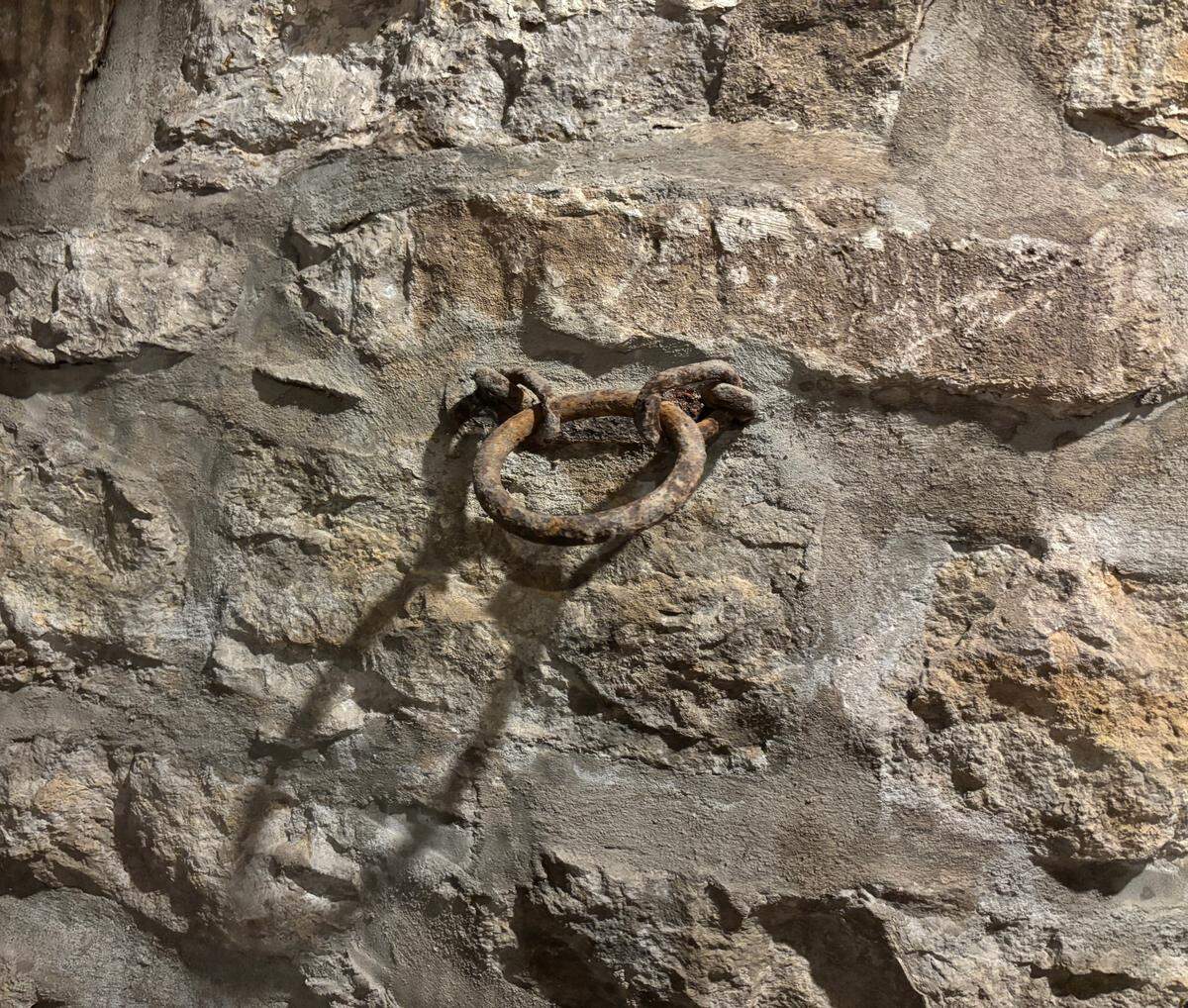 A metal shackle is still embedded in the basement wall of the Majors House, located at 82nd and State Line Road. Museum staff believe it was used to restrain enslaved people.