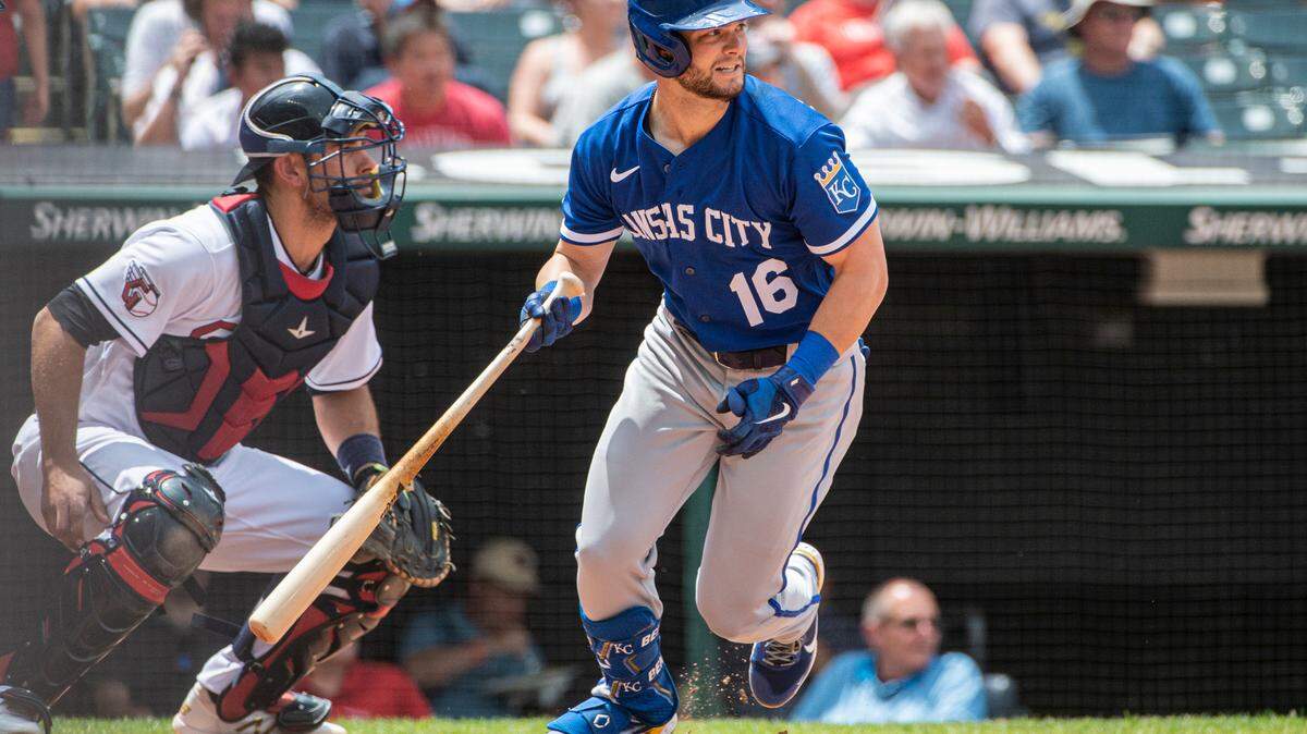 Kansas City Royals’ Andrew Benintendi watches his hit with Cleveland Guardians catcher Luke Maile during the third inning of a baseball game in Cleveland, Tuesday, June 1, 2022. (AP Photo/Phil Long)