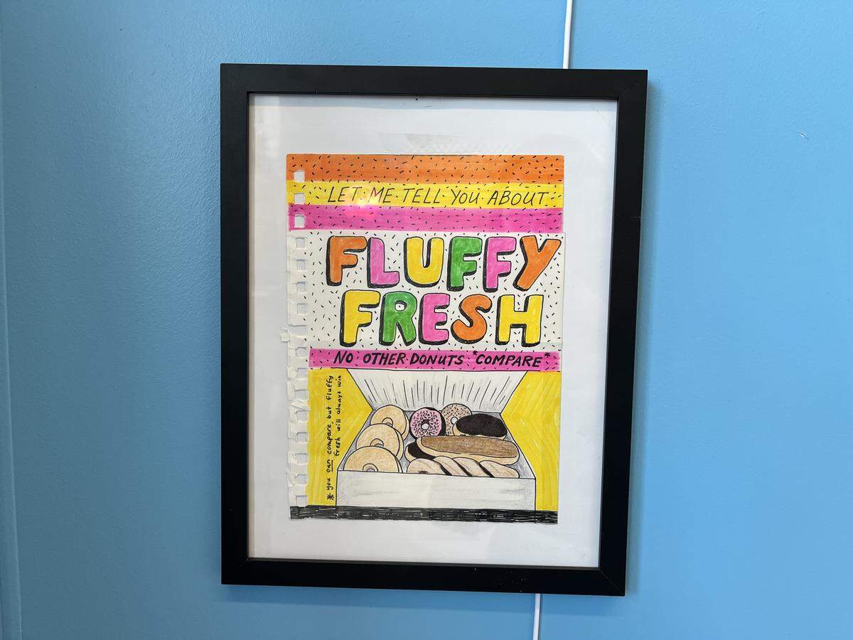 An illustration made by an old Fluffy Fresh Donuts customer. The Bensons received it in an envelope Wednesday and it now sits framed on the wall.