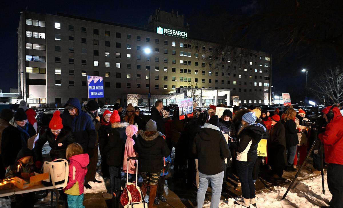 People gather outside Research Medical Center during a candlelight vigil to honor Alex Pretti on Thursday, Jan. 29, 2026, in Kansas City.