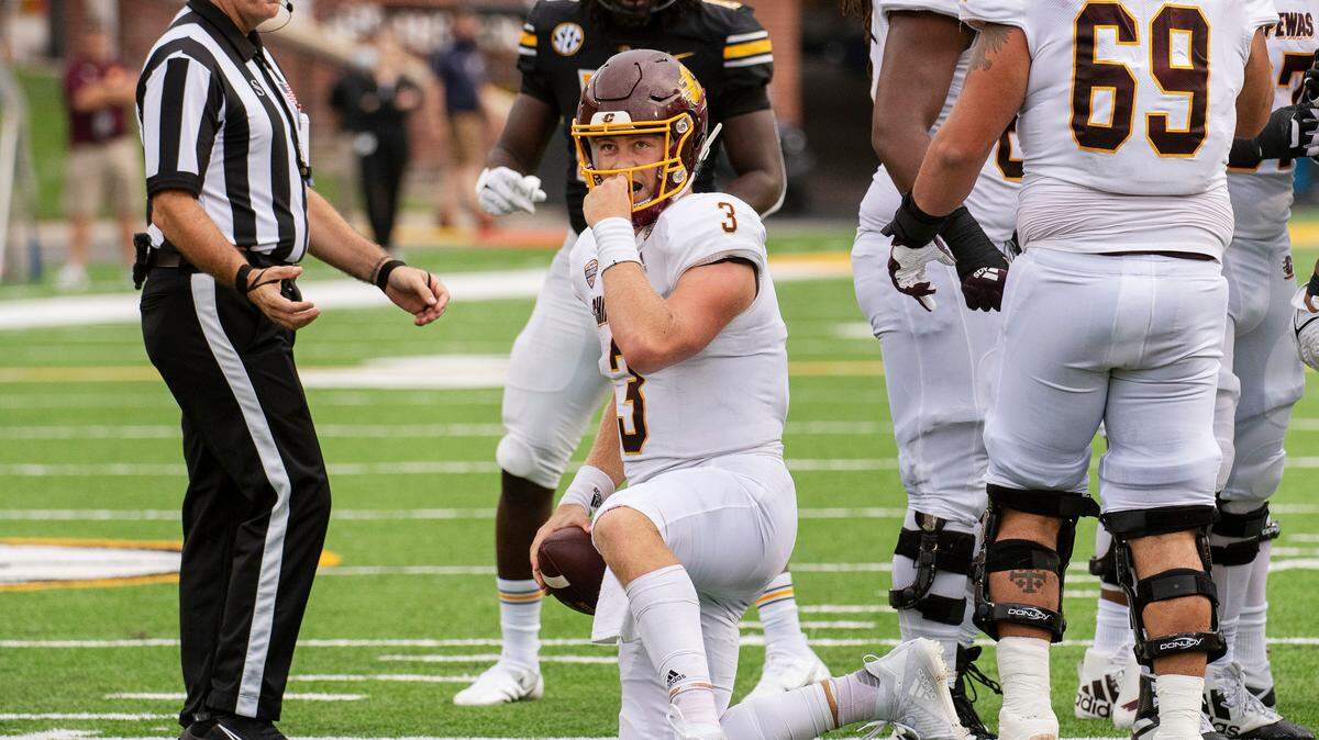 Central Michigan quarterback Jacob Sirmon straightens his face mask after being sacked during the third quarter of an NCAA college football game against Missouri, Saturday, Sept. 4, 2021, in Columbia, Mo. (AP Photo/L.G. Patterson)