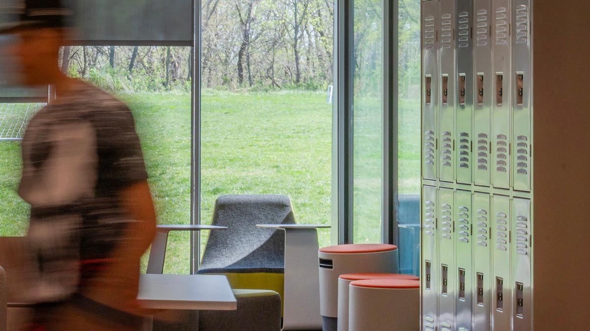 A student walks past a study area at Gloria Willis Middle School on Tuesday, April 16, 2024, in Kansas City, Kansas.