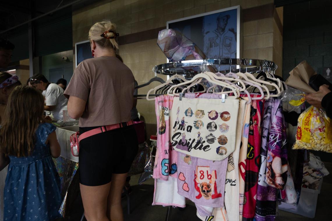 Vendors sold Taylor Swift merchandise Saturday at Kansas Swiftie Monarchs night at Legends Field.