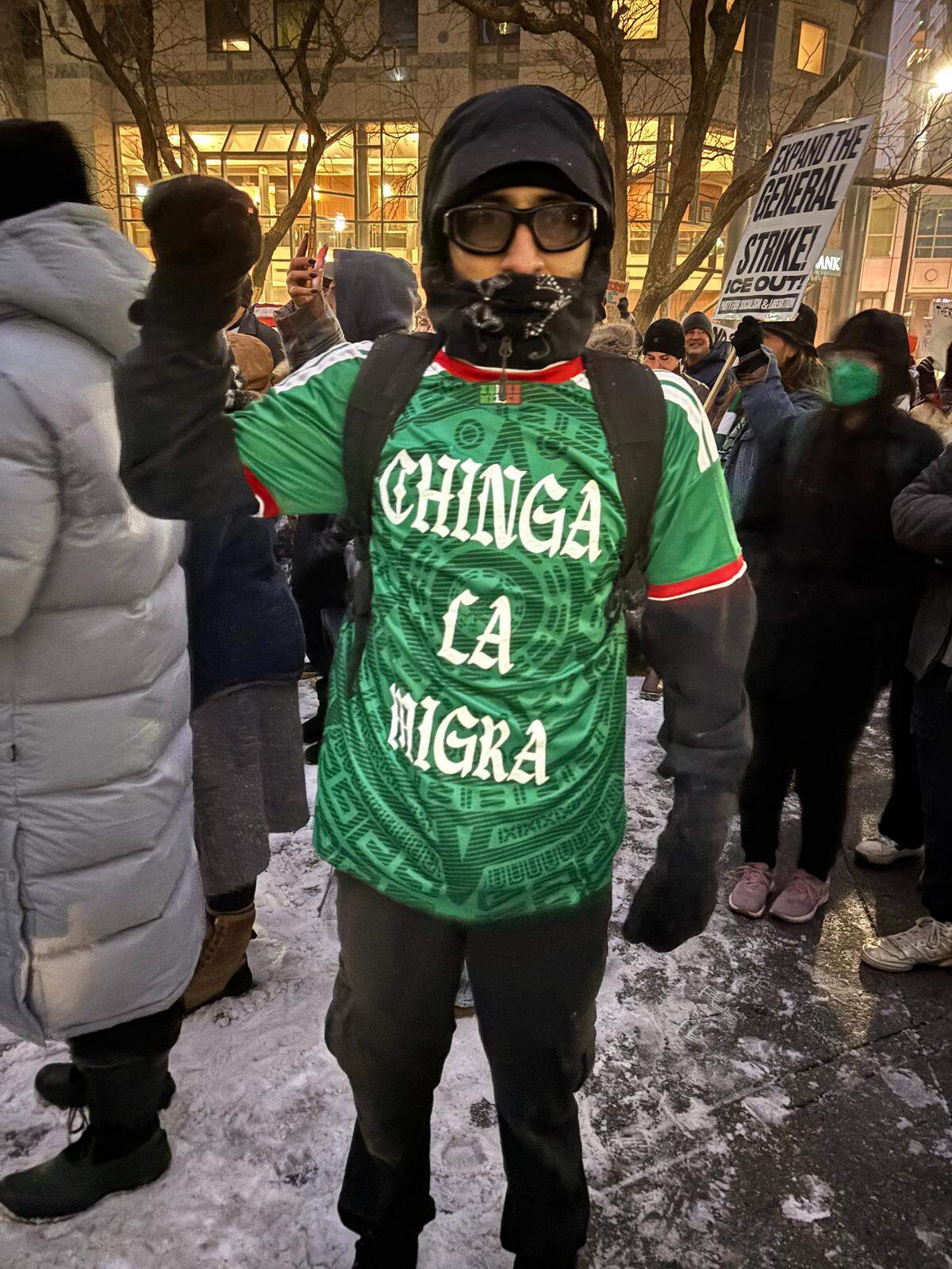 Pablo Muñoz shows his support for immigrants like his parents during a Kansas City protest over ICE on Friday, Jan. 30, 2026.