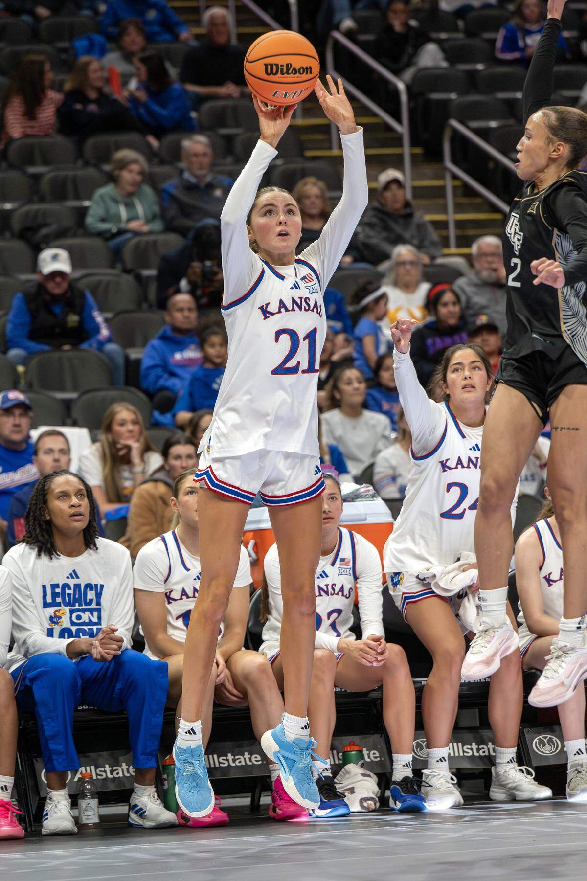 Kansas Jayhawks guard S'mya Nichols (12) attempts a 3-point shot against the UCF Knights during the third quarter of the Big 12 Women's Basketball Tournament at T-Mobile Center on Wednesday, March 4, 2026, in Kansas City.