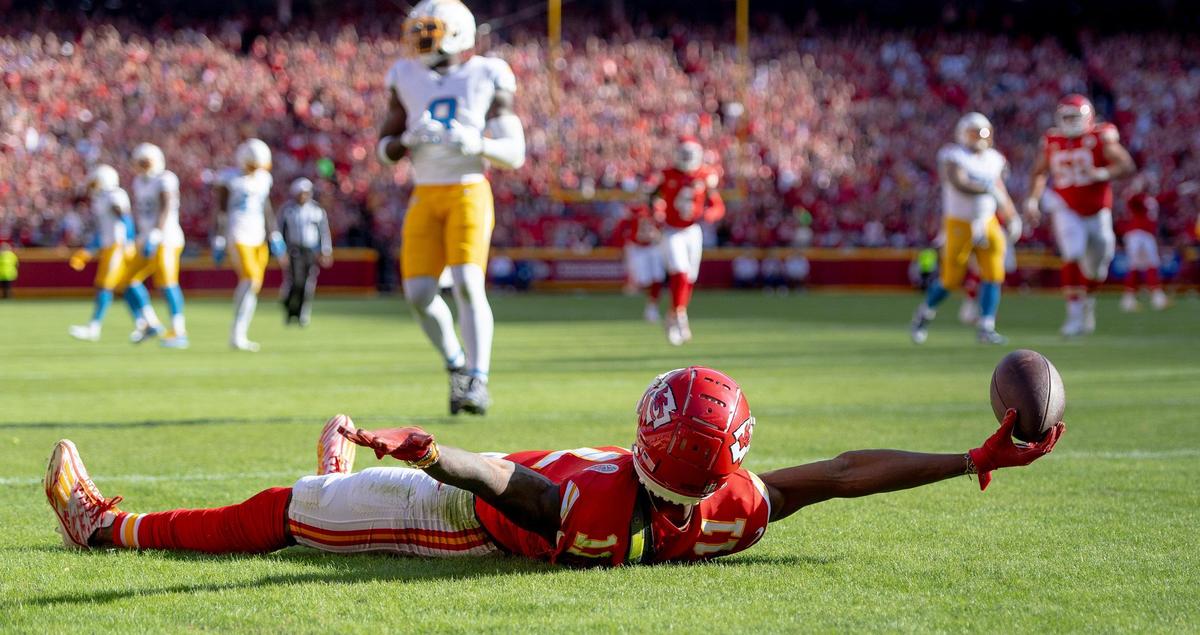 Kansas City Chiefs wide receiver Marquez Valdes-Scantling (11) celebrates a touchdown against the Los Angeles Chargers during an NFL football game at GEHA Field at Arrowhead Stadium on Sunday, Oct. 22, 2023, in Kansas City.