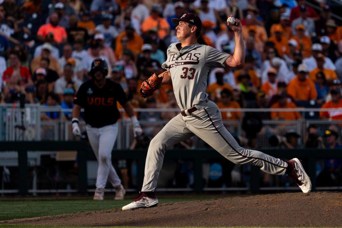 Texas A&M Aggies starting pitcher Justin Lamkin (33) pitches against the Tennessee Volunteers during the third inning at Charles Schwab Field Omaha on June 24, 2024. He was drafted by the Kansas City Royals in 2025.