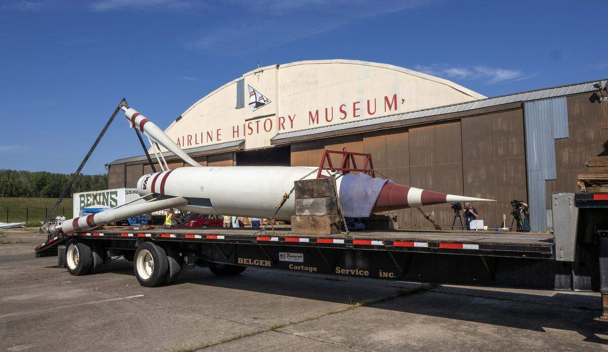 The Moonliner II was placed on its side on a flatbed trailer to move it from the Airline History Museum to the TWA Museum on Saturday. The replica rocket stood atop the TWA headquarters at 1785 Baltimore Ave. in Kansas City from 1956 to 1970.