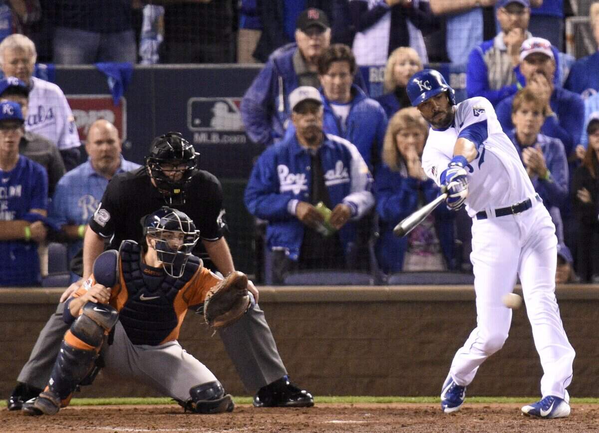 Kansas City Royals right fielder Alex Rios (15) doubles in the fifth during Wednesday’s ALDS baseball game on October 14, 2015 at Kauffman Stadium in Kansas City, Mo.