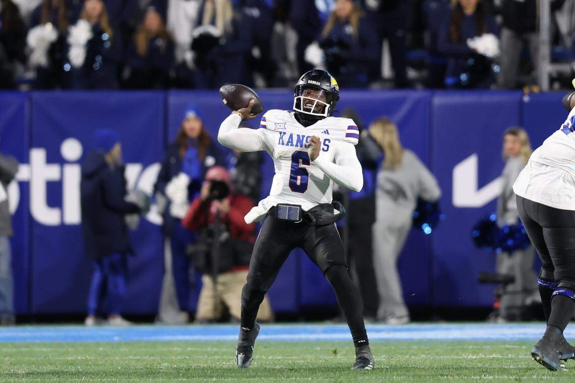 Kansas Jayhawks quarterback Jalon Daniels (6) passes the ball against the BYU Cougars during the fourth quarter at LaVell Edwards Stadium on Nov. 16, 2024.