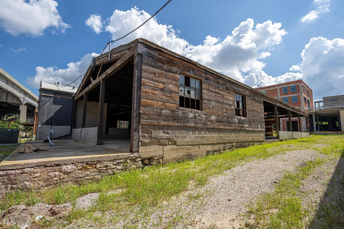 Weeds and overgrown brush have sprouted at Pennway Point, a planned entertainment development north of the Kansas City Ferris wheel.